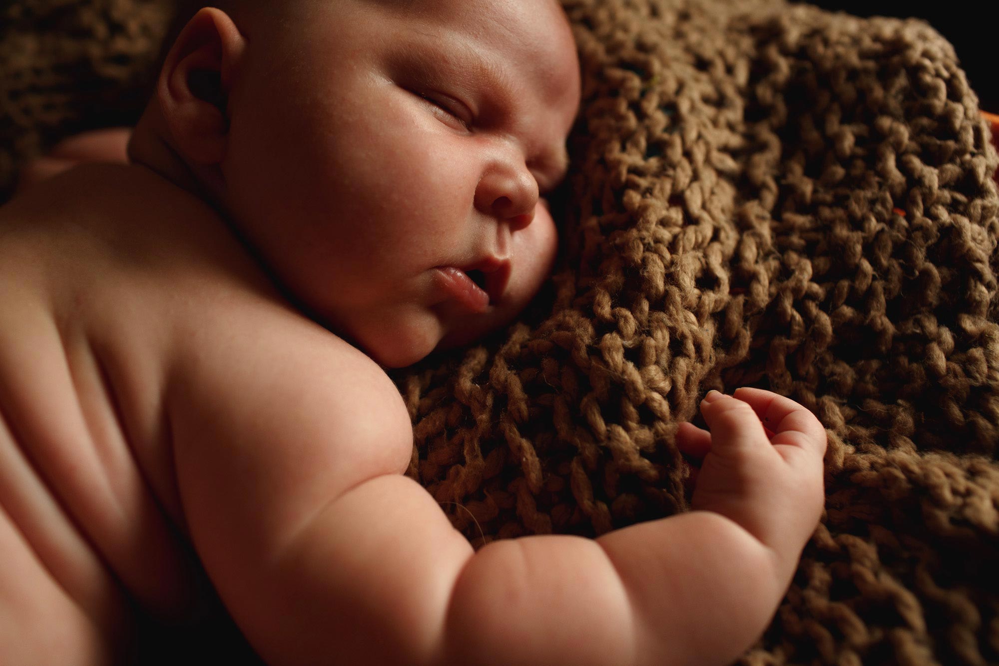 chunky newborn boy with lots of rolls